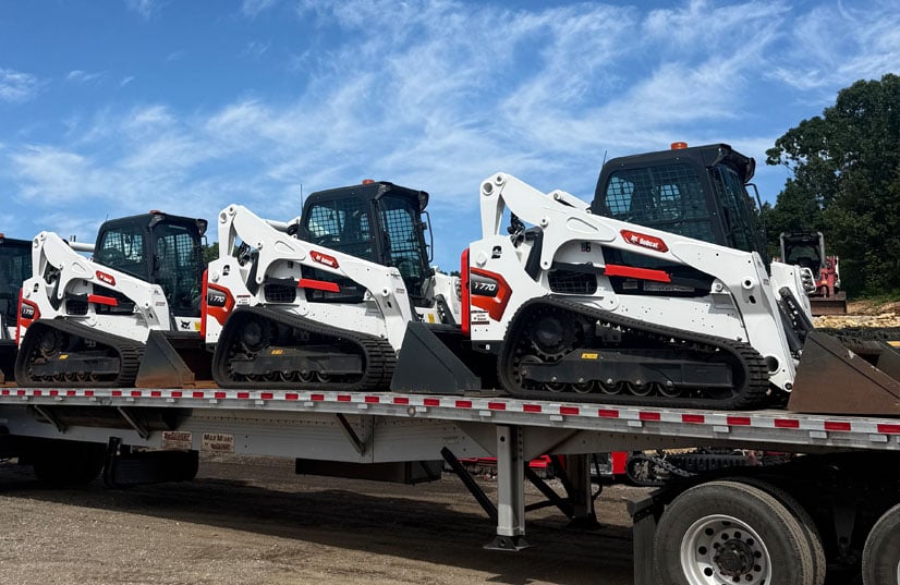 bobcat Skid Steers on a trailer